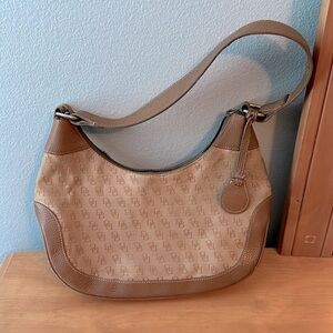 Dooney and Bourke classic monogram canvas and leather Tan color small hobo bag
